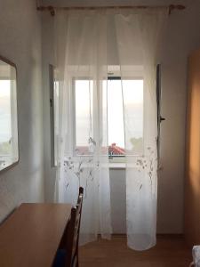 Fotografia z galérie ubytovania Sea view apartment v destinácii Postira