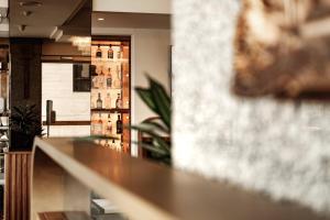 a bar in a room with a counter top at The Diplomat Hotel in Sliema