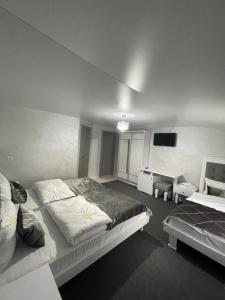 Letto o letti in una camera di Guest House Turda