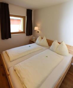 Posteľ alebo postele v izbe v ubytovaní Bodensee-Ferienwohnung Am Ruggbach