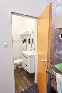 Ένα μπάνιο στο Aparthotel Wilma