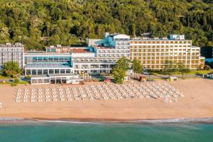 an aerial view of a beach with a hotel at GRIFID Encanto Beach Hotel - MediSPA, Ultra All Inclusive & Private Beach in Golden Sands