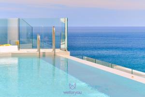 The swimming pool at or close to weforyou Med One Exclusive Sea Views 3 Bedrooms Apartament A 3A
