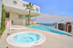 The swimming pool at or close to weforyou Med One Exclusive Sea Views 3 Bedrooms Apartament A 3A