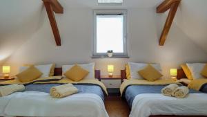 Кровать или кровати в номере Apartments Vinska Trta