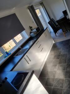 an overhead view of a kitchen with a sink at Collins Avenue in Norton