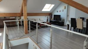 a view of a living room and dining room at Chez Jo et Mel - Gite et Yourtes in Bannost