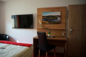 Postel nebo postele na pokoji v ubytování Hotel Jan van Werth