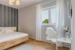 Postel nebo postele na pokoji v ubytování Villa Mokka - Perfekt ausgestattete Villa in hervorragender Lage