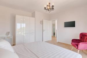 Postel nebo postele na pokoji v ubytování Villa Mokka - Perfekt ausgestattete Villa in hervorragender Lage