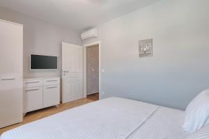 Postel nebo postele na pokoji v ubytování Villa Mokka - Perfekt ausgestattete Villa in hervorragender Lage