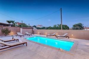 Bazén v ubytování Villa Mokka - Perfekt ausgestattete Villa in hervorragender Lage nebo v jeho okolí