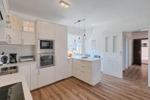 Kuchyň nebo kuchyňský kout v ubytování Villa Mokka - Perfekt ausgestattete Villa in hervorragender Lage