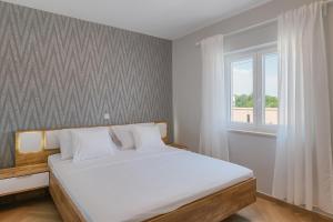 Postel nebo postele na pokoji v ubytování Villa Mokka - Perfekt ausgestattete Villa in hervorragender Lage