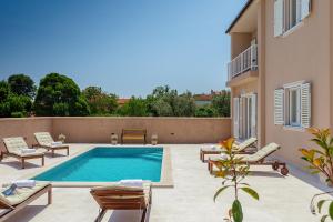 Balkón nebo terasa v ubytování Villa Mokka - Perfekt ausgestattete Villa in hervorragender Lage