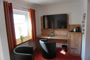 Kuchyň nebo kuchyňský kout v ubytování Hotel Jan van Werth