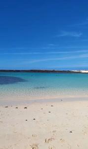 a beach with the ocean and the sky at Casita Paraiso 255 in Costa de Antigua