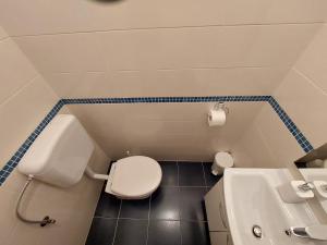 Koupelna v ubytování Apartments Amfora