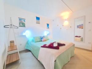 Postel nebo postele na pokoji v ubytování Quartos para viajantes, surfistas, grupos, Boa Energia