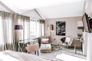 Et tv og/eller underholdning på Concorde Business Boutique Hotel