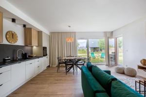 Kuchyň nebo kuchyňský kout v ubytování Apartament Kolory Ziemi