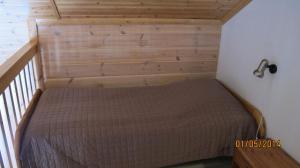 Postel nebo postele na pokoji v ubytování Lomakulkuri Apartments