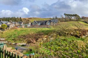 a house on a hill with houses on it at Finest Retreats - Dolwar Cottage in Ffestiniog