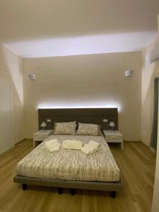 Postel nebo postele na pokoji v ubytování La maison del porto + 13 fotografií