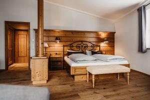 Posteľ alebo postele v izbe v ubytovaní Verwöhn-Wellnesshotel Walserhof