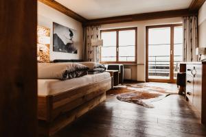 Posteľ alebo postele v izbe v ubytovaní Verwöhn-Wellnesshotel Walserhof