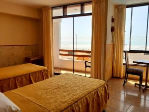 Llit o llits en una habitació de Hotel Huankarute