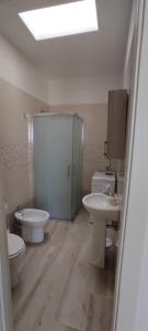 Ванная комната в Zona Maldive del Salento, Vistamare1, Sabbia 10' a piedi, BBQ, 2 Bagni, 2 Clima, Posto Auto Esclusivo