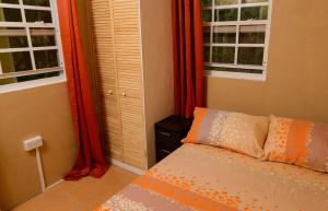 מיטה או מיטות בחדר ב-Sephina Villa St Lucia Island Dream Holidays