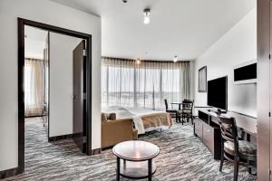 TV a/nebo společenská místnost v ubytování Hotel Mortagne