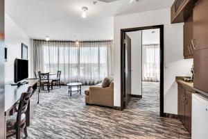 TV a/nebo společenská místnost v ubytování Hotel Mortagne