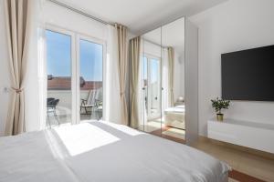 Posteľ alebo postele v izbe v ubytovaní Luxury Studio Apartment Honeymoon