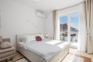 Posteľ alebo postele v izbe v ubytovaní Luxury Studio Apartment Honeymoon