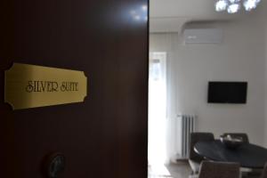 A television and/or entertainment centre at SILVER SUITE