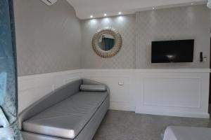 A television and/or entertainment centre at SILVER SUITE