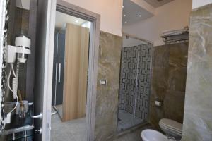 A bathroom at SILVER SUITE