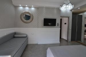 A television and/or entertainment centre at SILVER SUITE