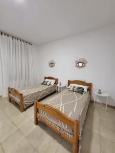Posteľ alebo postele v izbe v ubytovaní Global Immo 8008 CASA HENDRE
