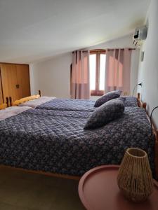Posteľ alebo postele v izbe v ubytovaní Global Immo 8008 CASA HENDRE