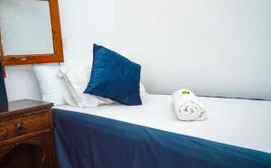 Postel nebo postele na pokoji v ubytování Hotel Al kassaba