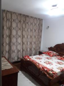 Łóżko lub łóżka w pokoju w obiekcie Cabana La Cucu