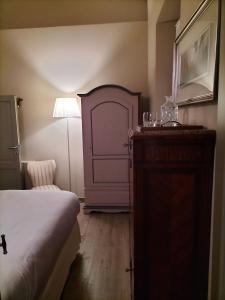 Posteľ alebo postele v izbe v ubytovaní B&B SASSO DI ROCCA