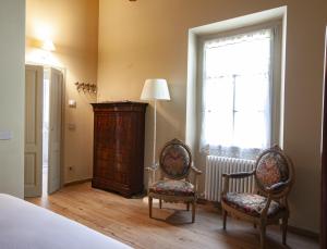 Posteľ alebo postele v izbe v ubytovaní B&B SASSO DI ROCCA