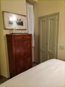 Posteľ alebo postele v izbe v ubytovaní B&B SASSO DI ROCCA