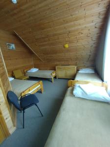 Postel nebo postele na pokoji v ubytování Tauriņkrasti
