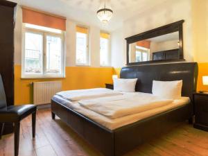 Ένα ή περισσότερα κρεβάτια σε δωμάτιο στο Villa Flora